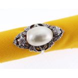 PLATINUM SET PEARL & DIAMOND DRESS RING, the baroque pearl (12 x 9mms) complemented by diamonds