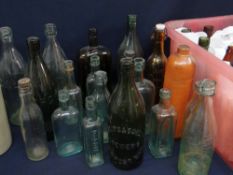 LARGE COLLECTION OF VINTAGE GLASS BOTTLES including beer bottles with moulded brewery labels,