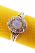 18CT GOLD OPAL & DIAMOND CLUSTER RING, the central opal (5 x 4mms) surrounded by twelve diamonds,