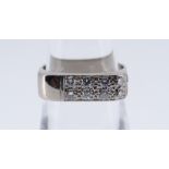 18CT WHITE GOLD DIAMOND SET RING set with eight diamonds, ring size N, 6.3gms, in black square