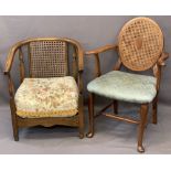 TWO VINTAGE BERGERE BACKED ARMCHAIRS including a mahogany example with oval back and stuff-over seat