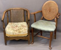 TWO VINTAGE BERGERE BACKED ARMCHAIRS including a mahogany example with oval back and stuff-over seat