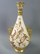 ROYAL WORCESTER BLUSH NARROW NECKED TWIN-HANDLED VASE of tapered form with a pair of ring and