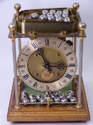 THWAITES & REED ROLLING BALL CLOCK, 20th Century novelty time piece, no 917 from a limited edition