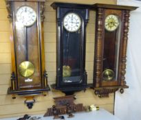 THREE VINTAGE VIENNA STYLE WALL CLOCKS having various enamelled dials set with Roman numerals in