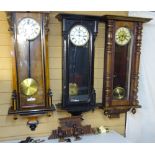 THREE VINTAGE VIENNA STYLE WALL CLOCKS having various enamelled dials set with Roman numerals in