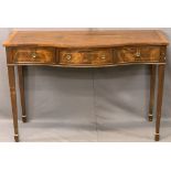 REPRODUCTION CROSSBANDED MAHOGANY SERPENTINE FRONT HALL SIDEBOARD having three frieze drawers with