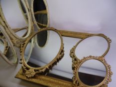 MIRRORS - three oval gilt framed mirrors, a dressing table mirror and an oblong gilt framed