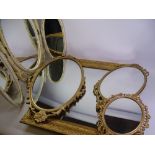 MIRRORS - three oval gilt framed mirrors, a dressing table mirror and an oblong gilt framed