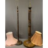 SUBSTANTIAL CARVED OAK COLUMN STANDARD LAMP and a vintage barley twist example, 167cm heights
