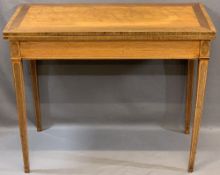 CIRCA 1840 CROSSBANDED SATINWOOD FOLDOVER CARD TABLE with inlaid detail to the tapering supports (