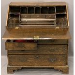 ANTIQUE OAK FALL FRONT BUREAU with interior slide well and good arrangement of drawers and
