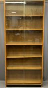 LIGHTWOOD MID-CENTURY TALL GLASS FRONTED BOOKCASE with interior adjustable shelves and four