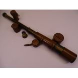 VINTAGE BRASS & LEATHERBOUND TELESCOPE inscribed 'Reconditioned for John Barker & Co Ltd, Kensington