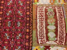 TWO SMALL COLOURFUL WOOLLEN RUGS, 135 x 70cms and 115 x 80cms