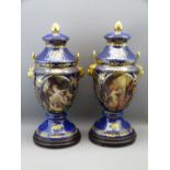 VIENNA STYLE VASES & COVERS, a pair on wooden plinths, overall H 52cms