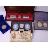 COMMEMORATIVE SILVER INGOTS & PLAQUES to include a cased set of three, The Royal Standards, pair