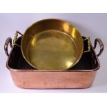 COPPER TWIN HANDLED BAKING PAN, 12cms H, 40cms W, 33cms D and a twin handled brass pan, 32cms