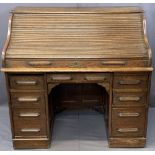 VINTAGE OAK ROLLTOP DESK, the tambour front opening to reveal a fitted interior of pigeonholes and