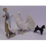 LLADRO DOVE, 20cms tall and a figure of a young girl feeding geese, 24cms tall, also a black Beswick