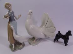 LLADRO DOVE, 20cms tall and a figure of a young girl feeding geese, 24cms tall, also a black Beswick