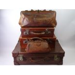 THREE OLD LEATHER SUITCASES & A GLADSTONE BAG