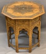 PERSIAN STYLE BRASS INLAID FOLDING TABLE, the octagonal top with central flower detail and multi-