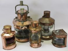 VINTAGE COPPER SHIP'S LAMPS the largest marked Masthead, 30cms H, a smaller example marked Anchor,