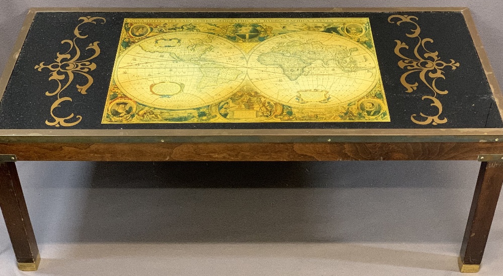 TEAK & BRASS FRAMED GLASS TOP COFFEE TABLE with World Map inset and gilt decoration, 40cms H, 105cms