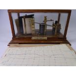 IMPROVED BAROGRAPH labelled 'James of Glasgow' in a glass case, 18 x 35 x 20cms with a quantity of