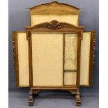 EMPIRE STYLE WALNUT ADJUSTABLE FIRESCREEN having carved leaf and fruit detail under a shaped top and