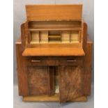 ART DECO WALNUT BUREAU CABINET with opening action to the drop-down front, interior pigeonholes over