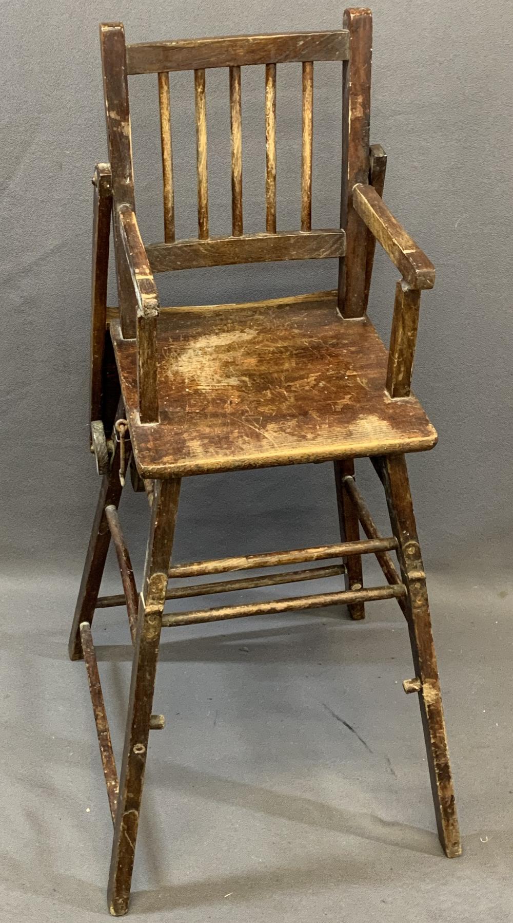 TWO CHILD'S VINTAGE HIGHCHAIRS including a metamorphic example with wheels, 101cms H, 37cms W, 47cms - Image 4 of 5