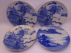 FOUR JAPANESE BLUE & WHITE POTTERY WALL CHARGERS Early 20th Century, 31cms approximate diameters