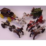 TOYS - cast iron models of horses, carriages, cannon fire and firemen, a good assortment