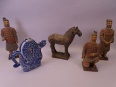 CHINESE POTTERY WARRIOR FIGURINES, horse and a lidded dragon teapot in blue and white, incised and