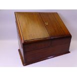 VICTORIAN MAHOGANY DESKTOP STATIONERY BOX having twin slope fronted doors opening to reveal a fitted