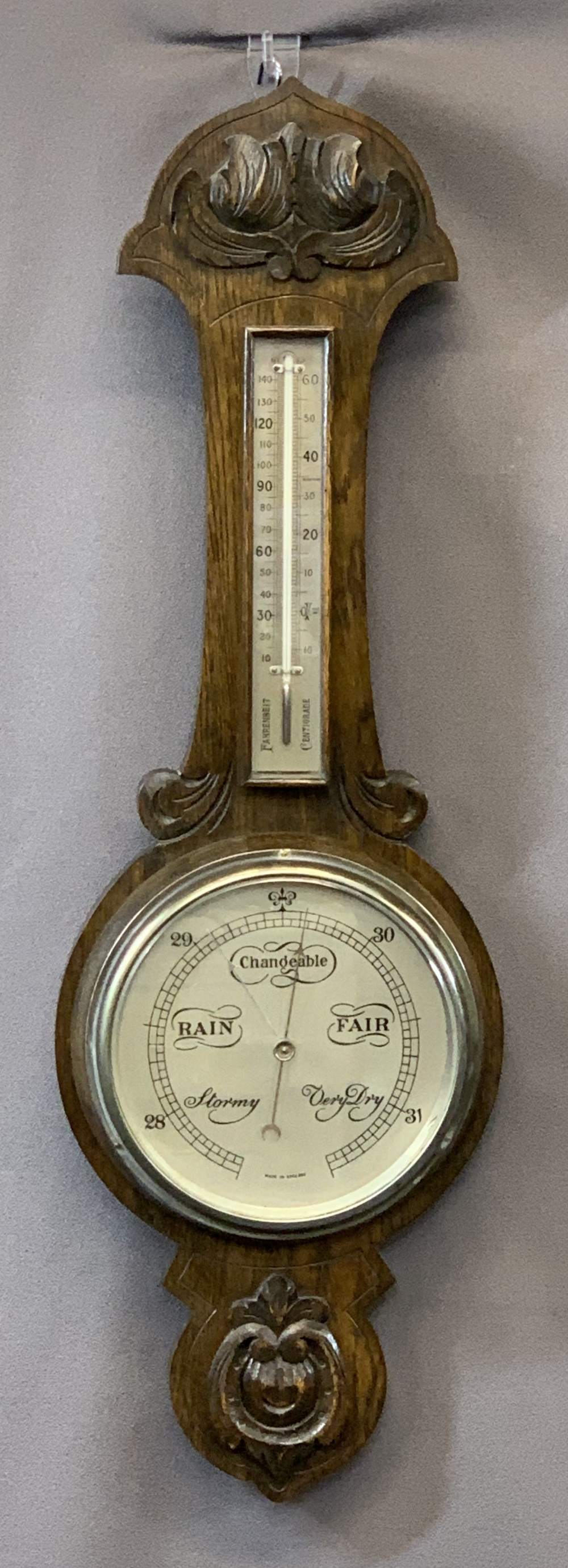 VINTAGE CARVED OAK BAROMETER WITH THERMOMETER, 33cms H, 26cms W