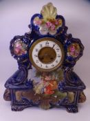 VICTORIAN DECORATIVE POTTERY MANTEL CLOCK in Cobalt Blue with a lower panel depicting maidens