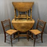 OAK BARLEY TWIST GATELEG DINING TABLE & ONE OTHER with two Edwardian cane seated side chairs,