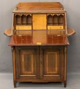 EDWARDIAN CROSSBANDED MAHOGANY FALL-FRONT BUREAU CUPBOARD having an upper railback shelf and twin