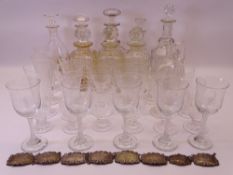 GLASS DECANTERS WITH STOPPERS, silver and other labels and a good quantity of drinking glassware