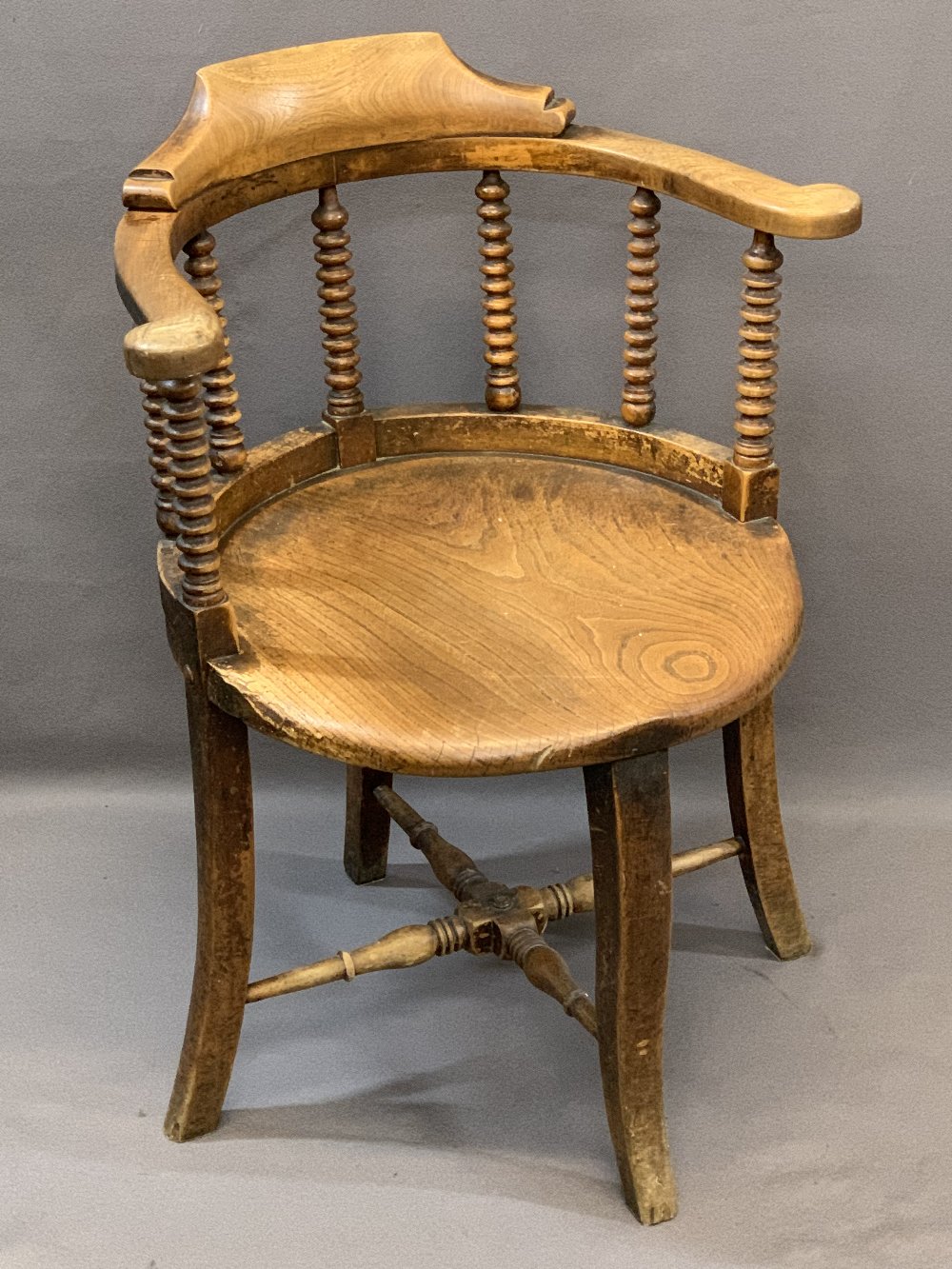 VICTORIAN CIRCULAR OFFICE ARMCHAIR the curved back with bobbin turned supports and lower turned