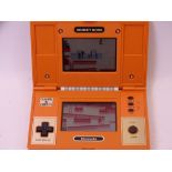 NINTENDO DONKEY KONG GAME & WATCH, multi-screen handheld console (appears working, though no