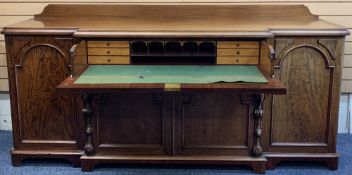 GOOD VICTORIAN MAHOGANY SECRETAIRE BREAKFRONT SIDEBOARD with shaped back rail over a moulded edge