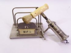 VINTAGE CORKSCREW WITH GEAR MECHANISM & DUSTING BRUSH and a plated calendar letter rack