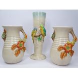 CLARICE CLIFF FOR NEWPORT POTTERY relief decorated vases (3) to include a 32cms H example with