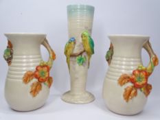 CLARICE CLIFF FOR NEWPORT POTTERY relief decorated vases (3) to include a 32cms H example with
