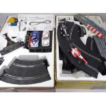 BOXED SCALEXTRIC SETS (2) including a Tourers 2000 and an F1 Super Teams, unchecked contents but