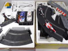 BOXED SCALEXTRIC SETS (2) including a Tourers 2000 and an F1 Super Teams, unchecked contents but